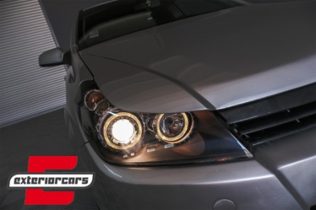 Prednja svjetla Angel Eyes (crna) / Opel Astra H (2004-2010), LPOP72